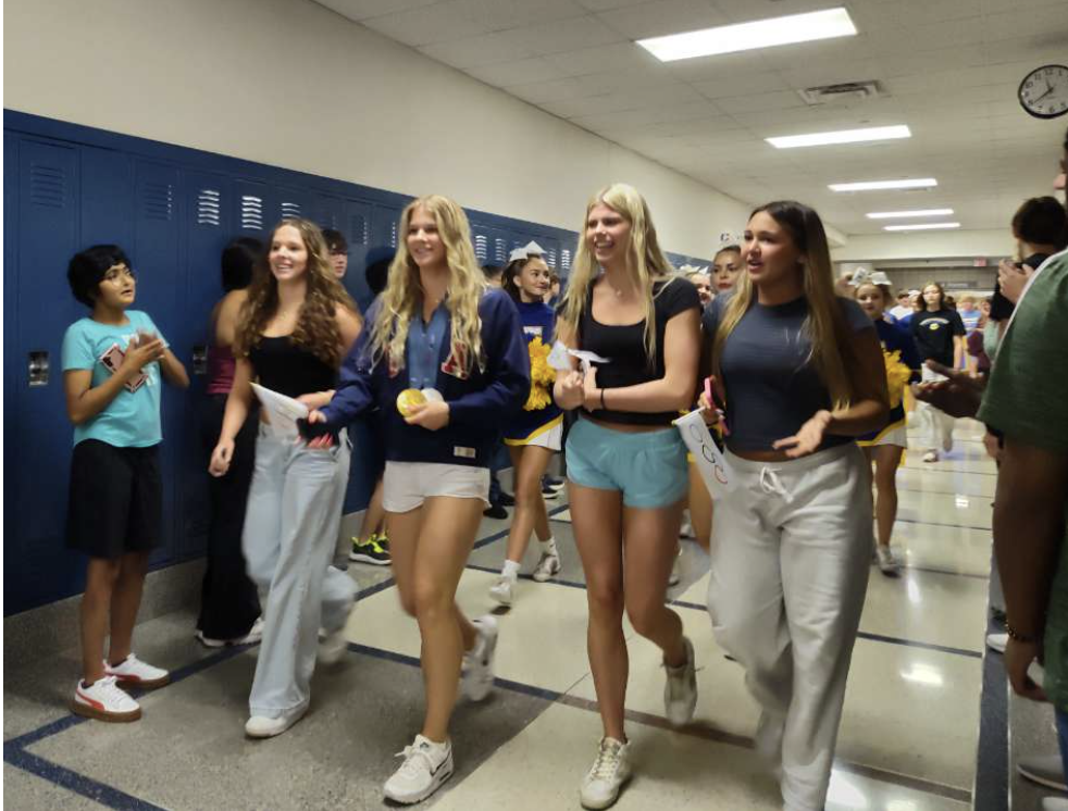 Alex Shackell and Carmel High School Students walk in the Walk of Champions